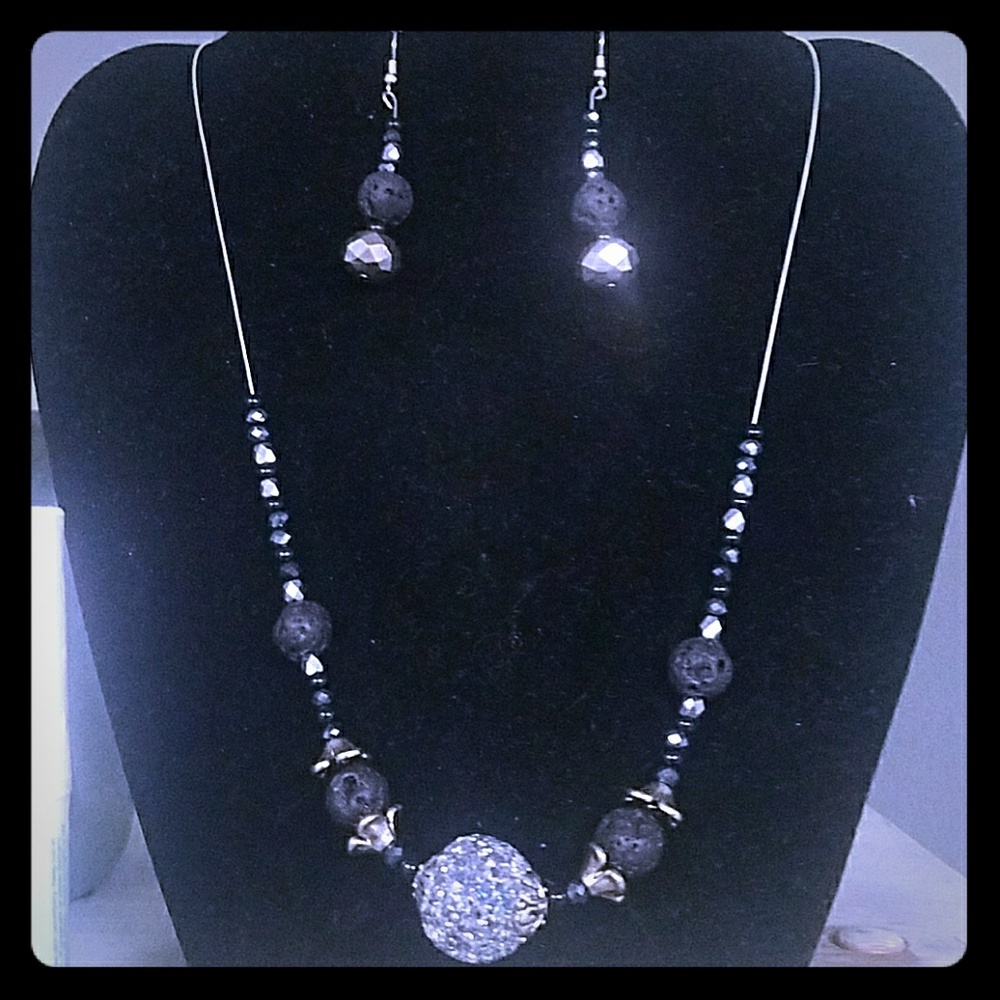 Essential oil diffuser necklace and earring set.